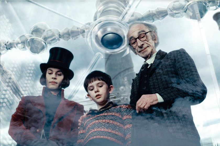 Charlie and the Chocolate Factory Picture 14, Movie low-angle shot of Johnny Depp as Willy Wonka, Freddie Highmore as Charlie, and David Kelly as Grandpa Joe standing in glass elevator